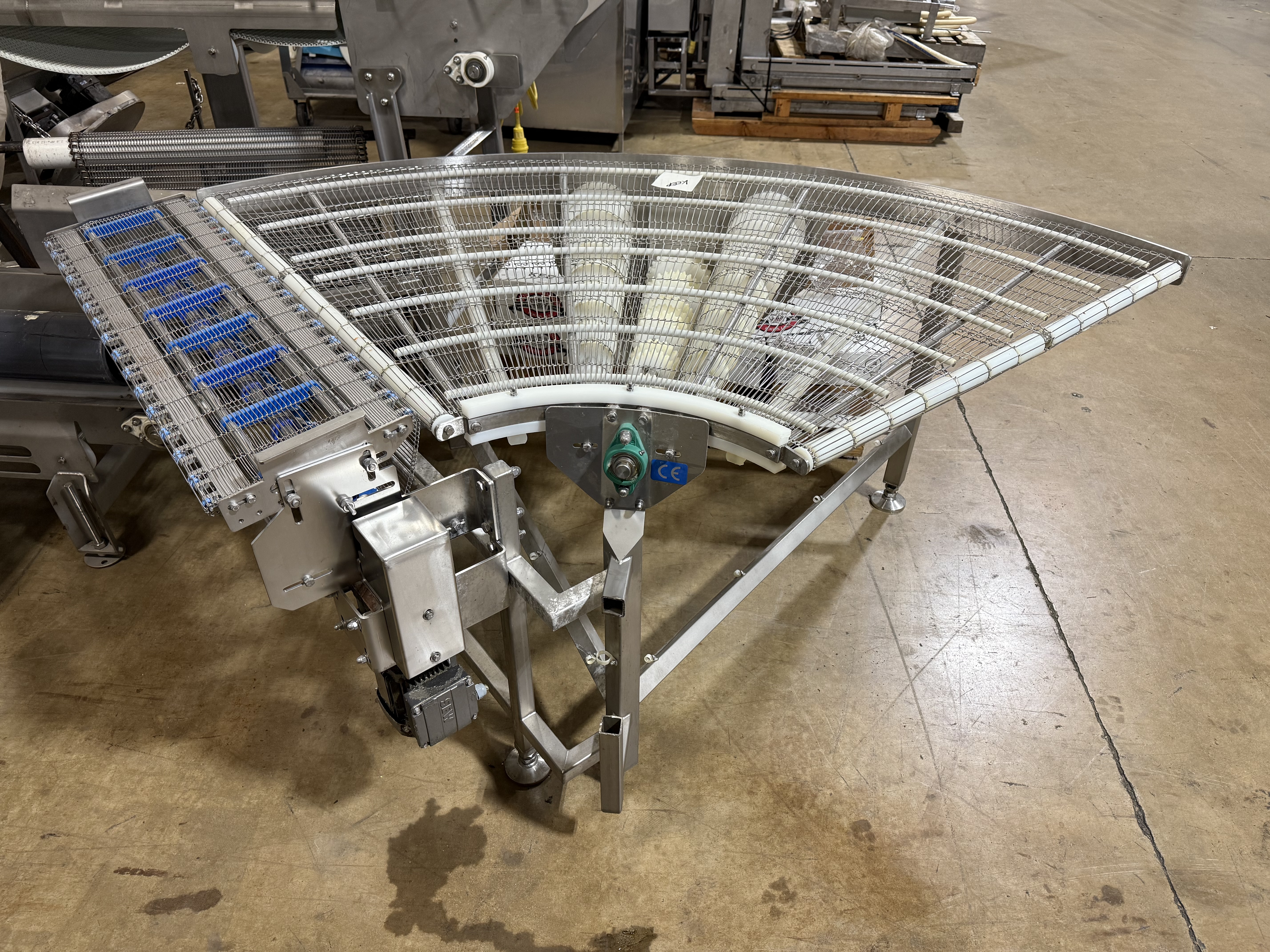 Used Flat Flex turn conveyor with discharge