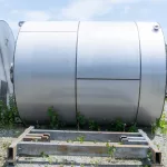 Tank, stainless steel, 10 ft high, 8 ft diameter, flat bottom